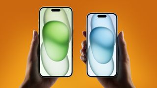 iPhone 15 on an orange background
